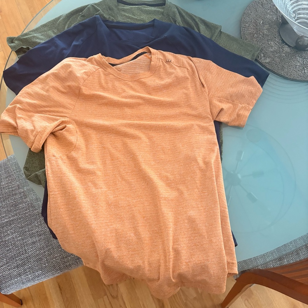 lululemon athletica Men's Heathered Orange Short Sleeve Crew.  All theee 30 b